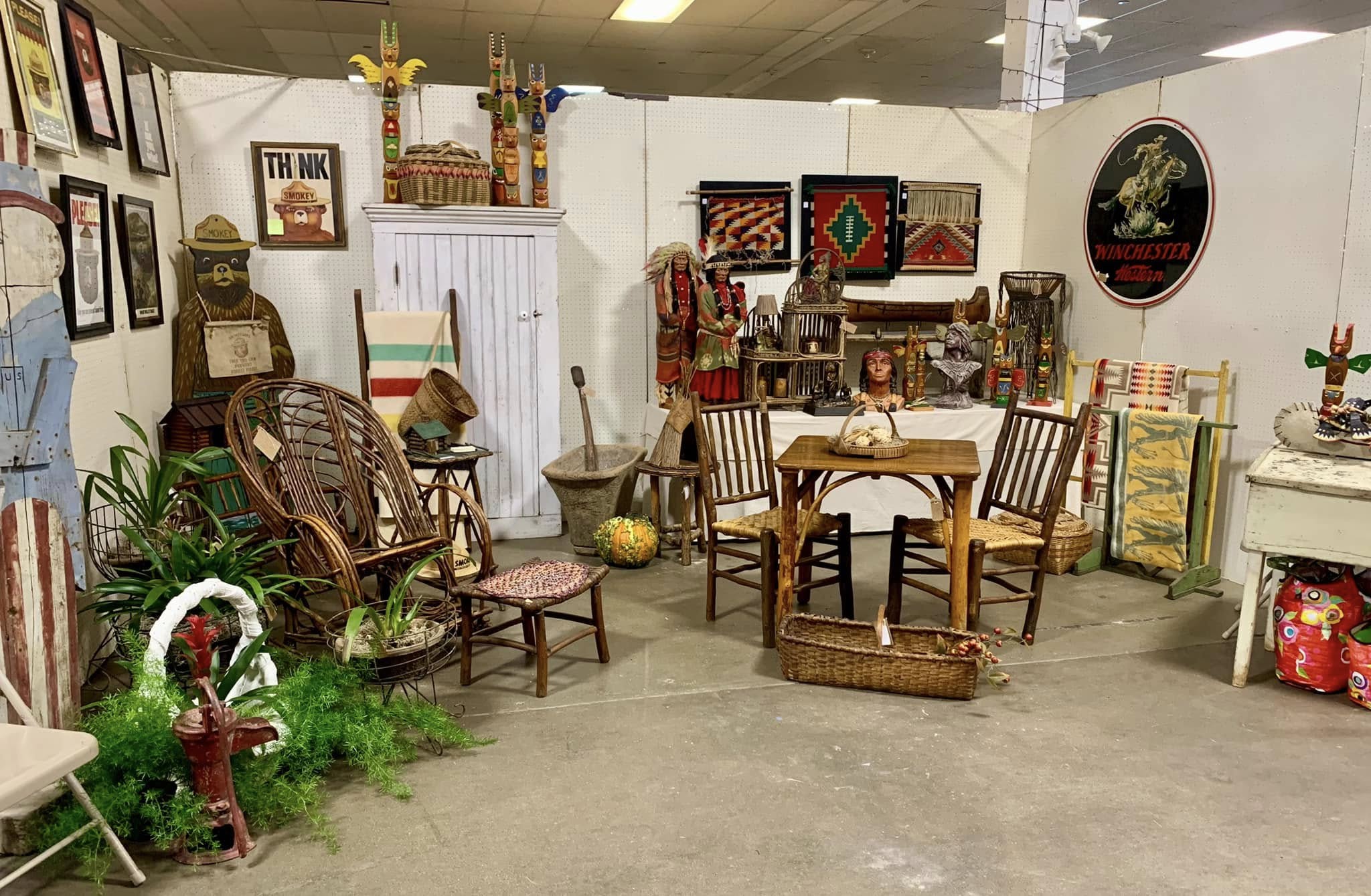 Antique shop with rustic furniture, Native American artifacts, and folk art